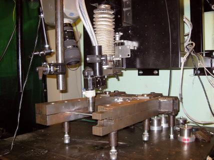 14th International Conference on Experimental Mechanics During welding, the specimen is clamped on both sides between two jaws.