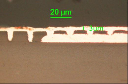 stacked staggered Via arrays with 20µm center-to-center pitch were created in this sample using 248nm excimer laser ablation through mask projection, forming hundreds of vias at one time. Fig.