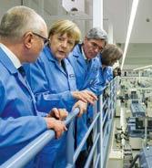 International appeal and radiance German Chancellor Angela Merkel (second from left) and Siemens CEO Joe Kaeser (third from left) visit Siemens Digital Factory in Amberg.