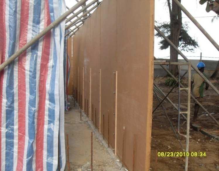 118 walls. Figure 4 indicates the installation of Dura panels to form an external wall. In the initial phases, an insitu-cast wet joint has been used to connect the panels.