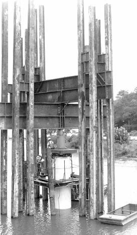 LOAD TEST Reaction frame and hydraulic jacks used to load test a 54- in. concrete cylinder pile. Slide No. 22 LOAD TEST Slide No.