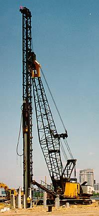 PILES Crawler crane w/ single acting air hammer and hydraulic leads. Driving 12-in. concrete piles. Slide No. 2 PILES Slide No.