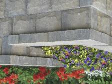 Step Downs with AB Fieldstone Creating a step down is similar to building an outside corner as it uses the same facing units that are manufactured with a textured side and has the same placement of