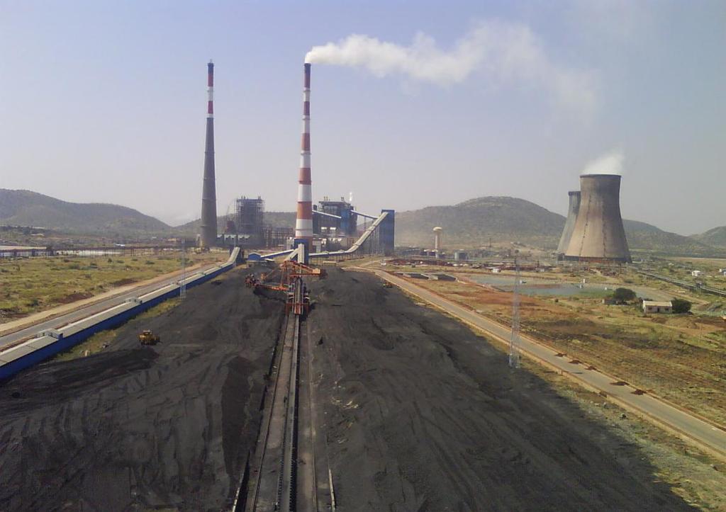 Fig. 1 Typical coal stockpiles in a Thermal Power Plant 4 PROBLEMS FACED WITH THE PRESENT STCOKPILE SYSTEM: There are several problems being faced with the present type of open stockpile system.