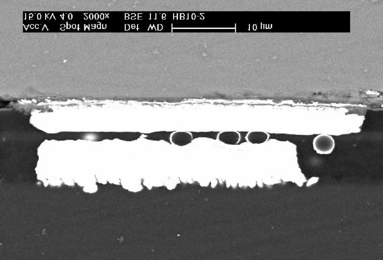 1192 Y.C. Chan, D.Y. Luk / Microelectronics Reliability 42 (2002) 1185 1194 Fig. 12. SEM micrograph showing the conductive particles trapped within the ACF joint of Ni bump FCOF assembled at 200 C.