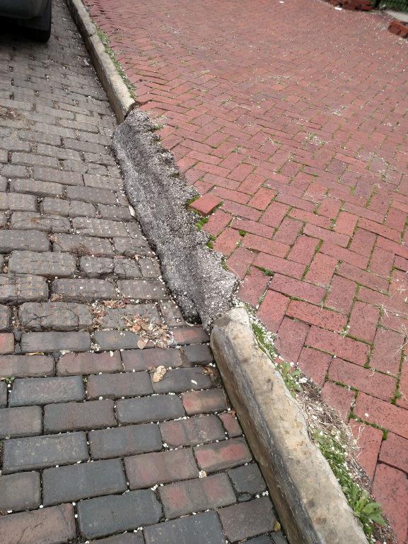 3. Missing curb or temporary asphalt curb in place. a. Inspection Item: Missing curb or temporary asphalt curb. b.