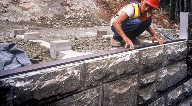 The Retaining Wall System is a gravity structure constructed of individual precast units.