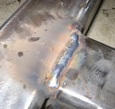 up to molten hot temperatures, and then manipulating the molten weld puddle to create a weld bead.