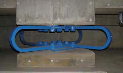 Figure U-shaped steel dampers employed to separate the upper structure from the foundation, while the latter is necessary in order to control the deformation in the isolation system as well as