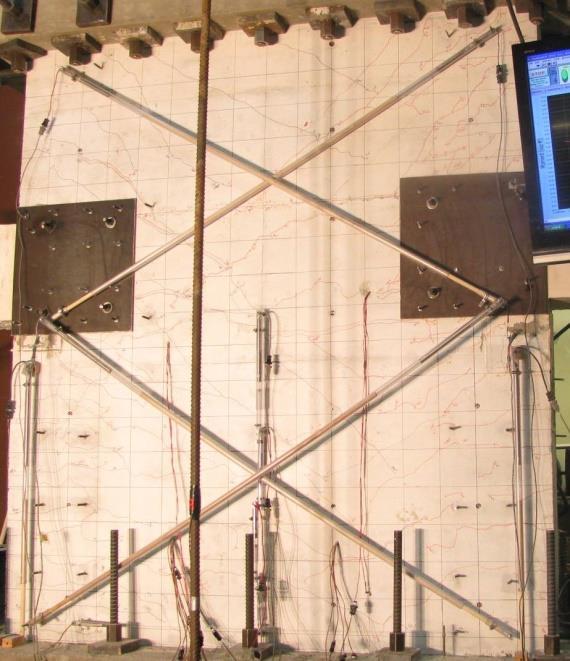 Each of the walls tested in this study were used previously for testing of steel reinforced concrete (SRC) coupling beams (Motter et al, 2014), which resulted in significant damage at the