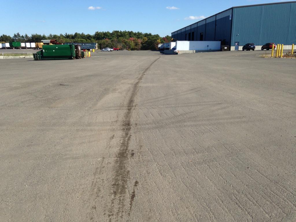 Photograph 1: View of roadway pavement after cleanup at Building 6 at the E.L.