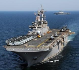 aircraft carrier USS Essex > Mobile print centers in containers for the ground troops are under investigation by several