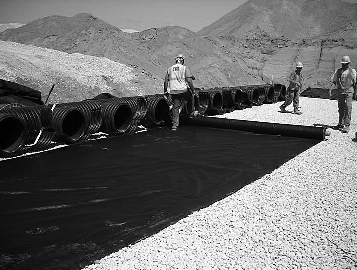 Manifold, Scour Fabric and Chamber Assembly Install manifolds and lay out woven scour geotextile at inlet rows [min. 12.