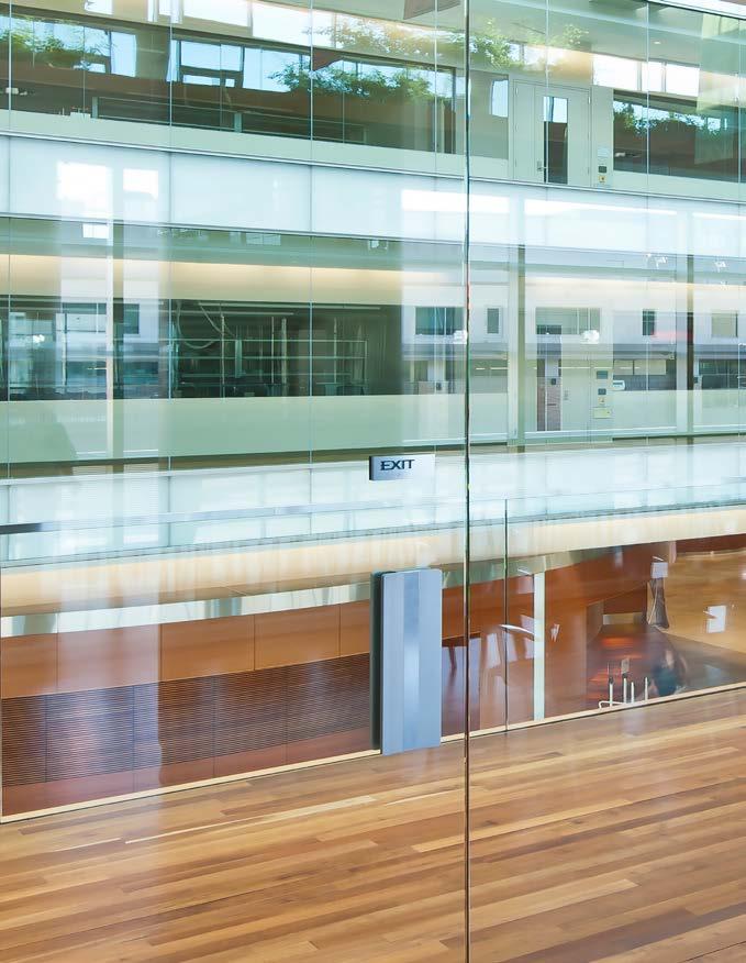 movable partitions allow natural light to flood the interior space while providing space flexibility.