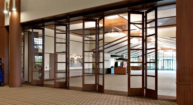 Timberframe GlassWall consists of glass surrounded by wood frames composed of triple-laminated solid wood top rails, bottom rails and stiles that are constructed from custom made veneers, solid wood