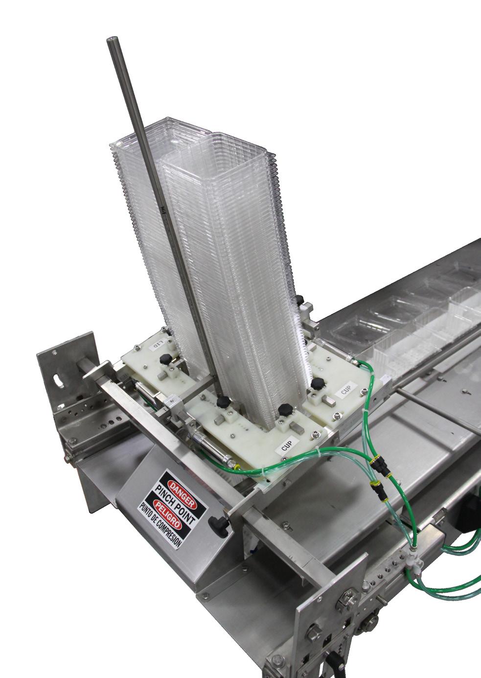 As the hopper eye (included) mounted on your filler s hopper recognizes berries and a need for containers below, the denester simply flicks the container down onto the conveyor.