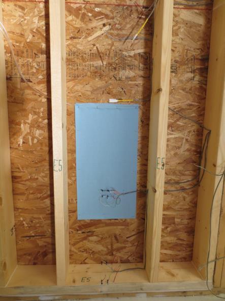 For Phase IV, wetting systems were installed on both the interior and the exterior of the exterior sheathing at locations