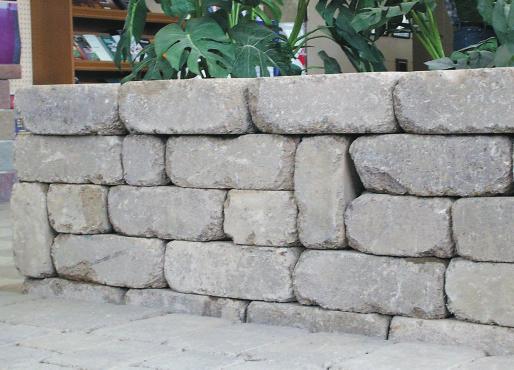 DIMENSIONAL CLASSIC This versatile rustic stone block is ideal for planter walls, light stands, barbeque enclosures, outdoor bars, driveway entrance pillars and edge restraints.
