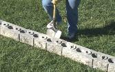 INSTALLING ON SOIL Step : Layout Determine the location of the wall panel and lay the first course of block to determine the shape of the wall and