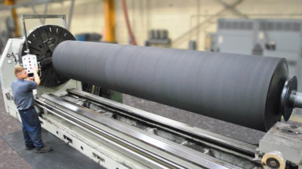 and crown calculating & forming. Speak to your Menges Sales Engineer for further details or to schedule your roll recover project. This large process roll is for a major paper corporation.