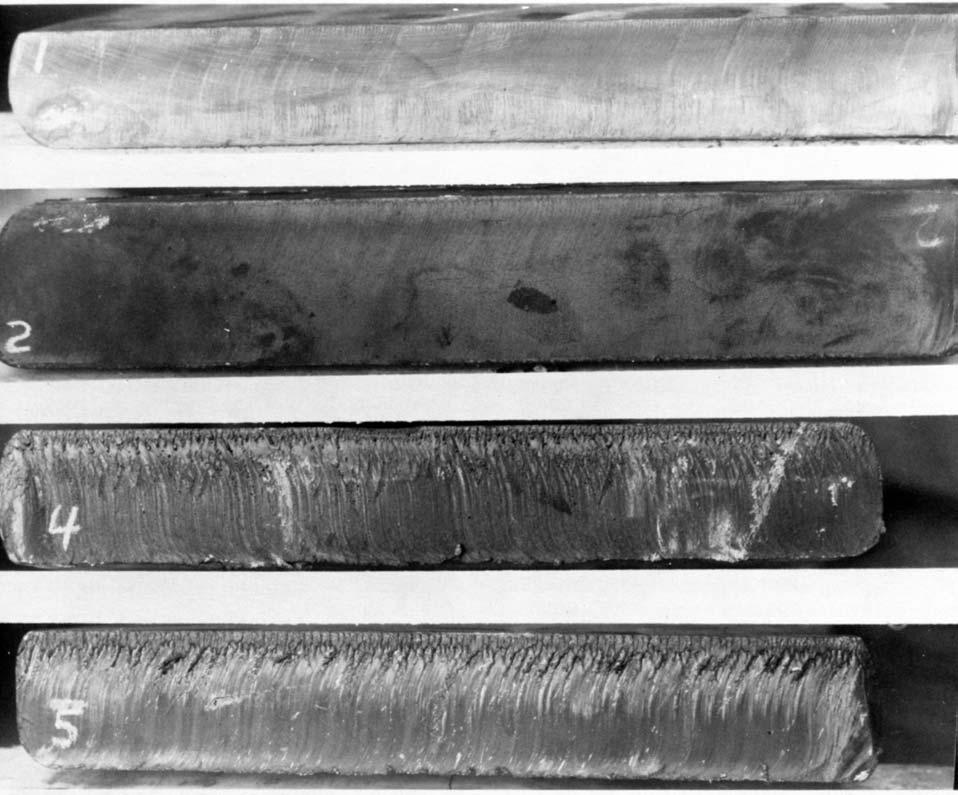 Figure 32. Cuts produced by plasma-arc process. (Top to bottom: Nickel 200, 1-1/2 in.; MONEL alloy 400, 2 in.; INCOLOY alloy 800, 1-1/2 in.; INCONEL alloy 600, 1-3/4 in).
