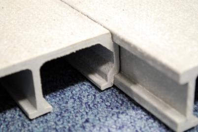 Cored, or sandwich panels with solid plate on the top and underside of the grated centre, it offers