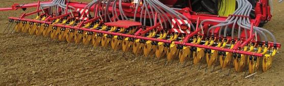 (by-pass valves) or it is divided among adjacent sowing coulters (closing