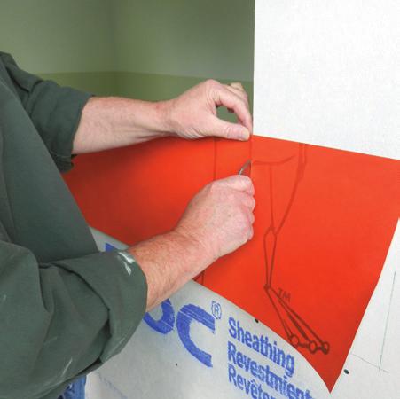 Cut and install VaproFlashing SA patches over pre-punched holes