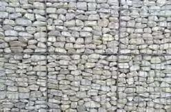 loadings. The design does not consider that the gabion mesh contributes to the stability of the structure. The design code applicable to gabions is BS EN 1997-1:2004 and BS 8002:2015.