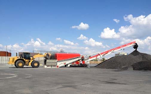 payloaders in a stockyard Mobile Truck Unloader stockpiling coal