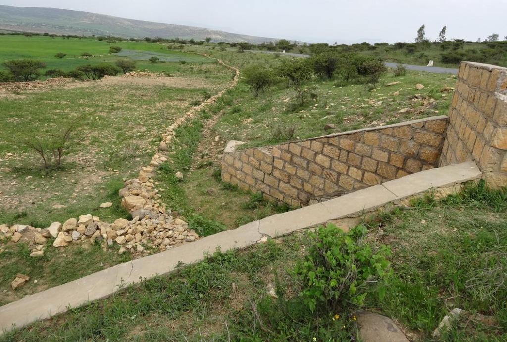 a culvert is channeled into farmlands (used for