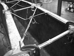 Figure 4.23 Tension Braces Still Intact after Failure The out-of-plane buckled shape of the girder just before failure, as seen in Figure 4.24, was the same twowave shape seen in previous tests.