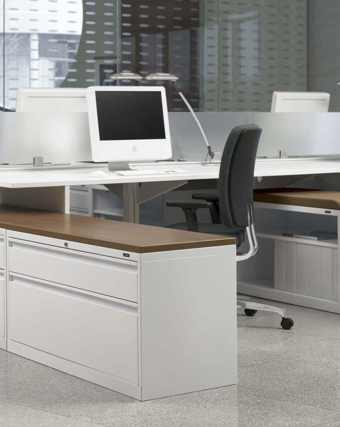 Evolve worksurfaces also provide scoops to pass wires from more permanent desktop equipment to the primary base feed.