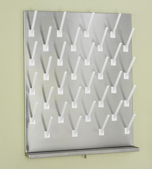 Each V style pegboard includes an integral drip trough, wall bracket, standard 6" white pegs and 3 ft. of clear plastic drain hose.