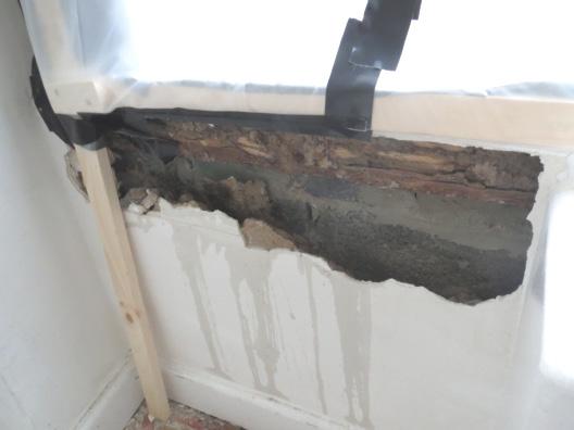 Comments from the design review regarding sill flashing installation were not implemented; the leakage could have been avoided with proper construction oversight.