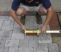 When it comes to marking and cutting pavers, there are many tools that make this easier.