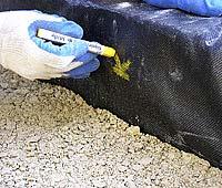Make a mark on the side of the excavation with a line using a marker or a carpenter crayon.