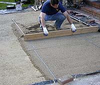 If the bedding sand is not covered by pavers, rain or other disturbances can disrupt the bedding sand, requiring it to be re-screeded the following day.