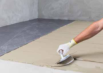 The adhesive is spread in the same direction on the back of the tile and on the substrate After applying the adhesive using the double-buttering method, it is