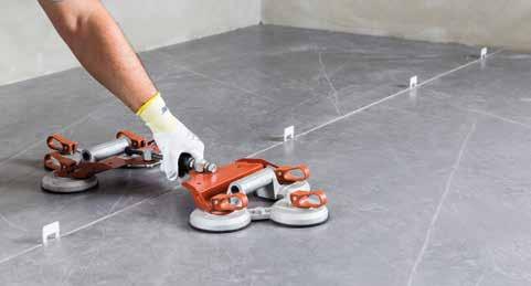 Tile-positioning tool Always make sure the grout lines are clean before grouting.