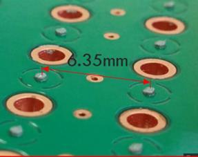 Each through-hole is manually soldered using solder wire. In the third step, SAC305 solder paste is printed on the bottom board using a 5 mil thick stencil onto the copper pads.