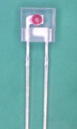 package. The miniature side-facing device has a chip, that emits radiation from the side of the clear package.
