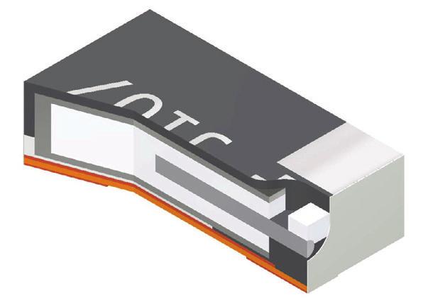 The conductive polymer layer is then coated with graphite, followed by a layer of metallic silver, which provides a conductive surface between the capacitor element and the outer termination (lead