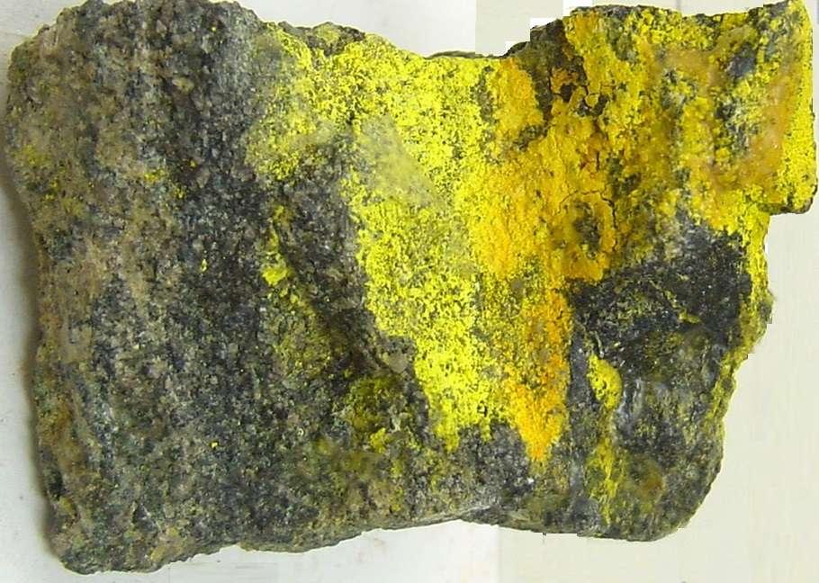 Carnotite is a bright to greenish yellow secondary mineral of