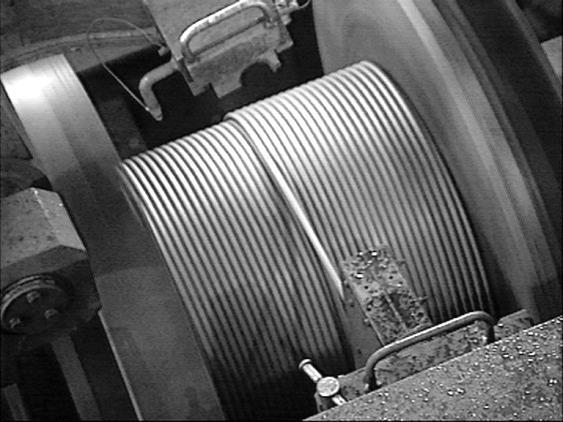 INTEGRATION WITH K-SPOOL HOT ROLLED COIL SPOOLER LINE The establishing of the EWR process is the pre-cursor of an approach to production of hot rolled coils of customized weight; already installed