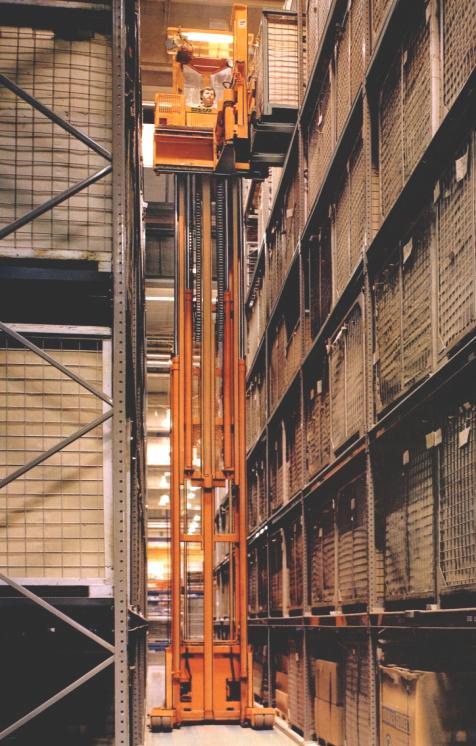 (a) (b) Fig. 5 Pallet rack operated by a Very Narrow Aisle truck a. "Man-up" operation b. Dynamic effects when simultaneously driving and lifting Fig.