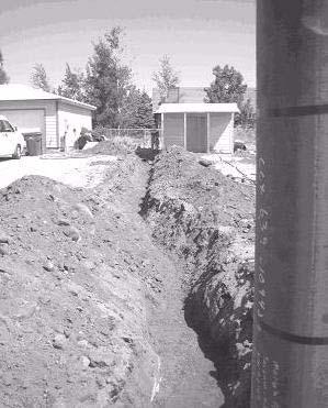 The trench should be at least 18 inches (46 cm) deep. Figure 2 14: Trench for Conduit 30.