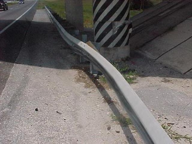 This guardrail has been hit by a vehicle.