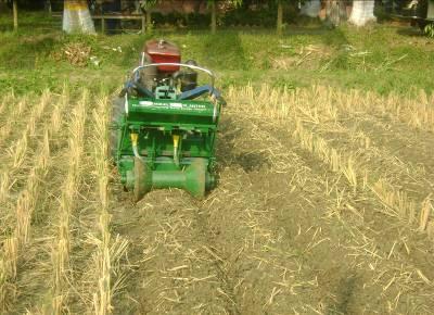 240 HOSSAIN et al. when soil moisture and optimum planting time is critical. This drill is structurally improved, lighter in weight and more versatile for different adjustment.