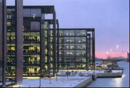 In the evening the glazed building receives a third dimension and becomes a lantern expressing comfort in the dark (see figure 3.5). Figure 3.5 Night picture of a glazed office building. 3.2.